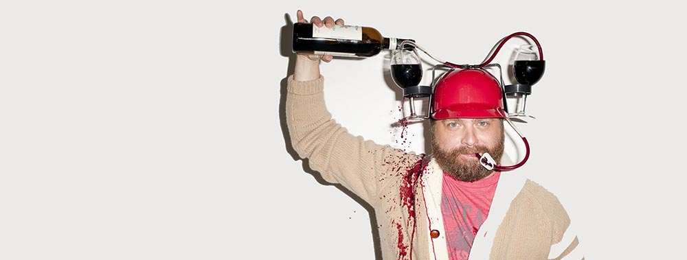 Zack Galifianakis with an overflowing wine hat